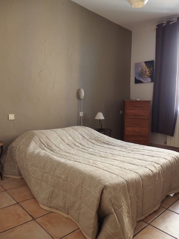 Фото Au Saint Roch - Hôtel et Jardin