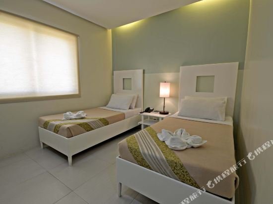 Фото Empire Suites Hotel