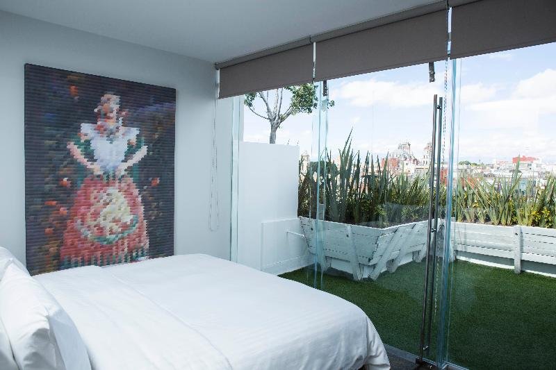 Фото Ikonik Hotel Puebla