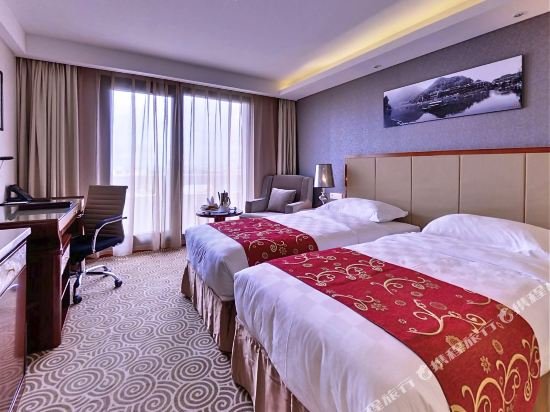 Фото Huatian Chinagora Hotel