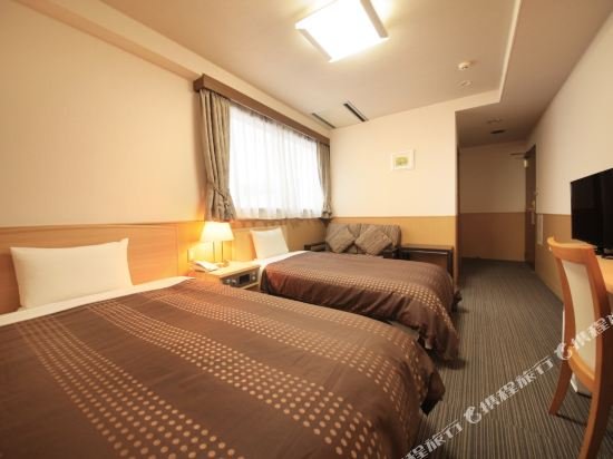 Фото Sendai Business Hotel