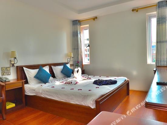 Фото Kaung Myint Hotel