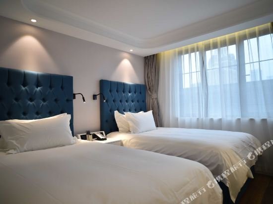 Фото Shanghai Jinchen Hotel