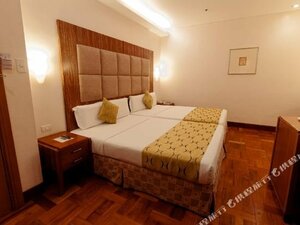 Гостиница Отель City Garden Suites Manila