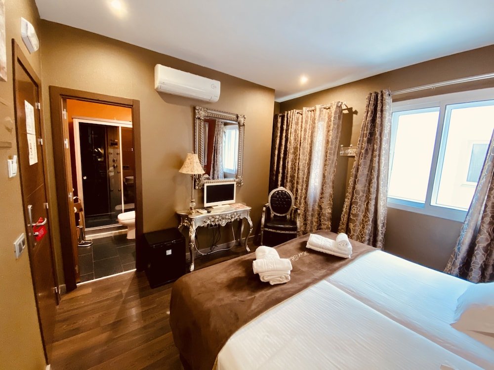 Фото Sweet Sevilla Suites