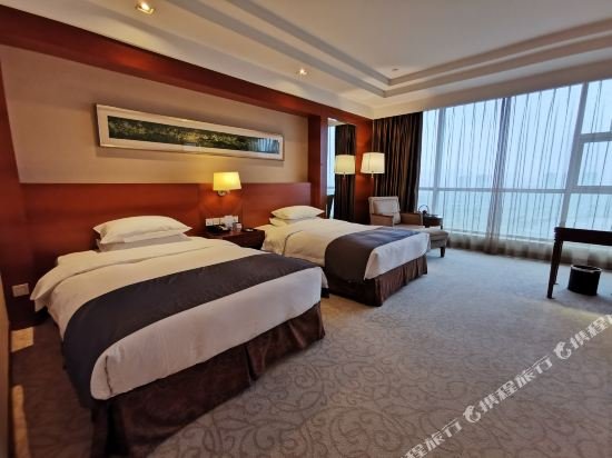 Фото Grand New Century Hotel Ninghai Jinhai