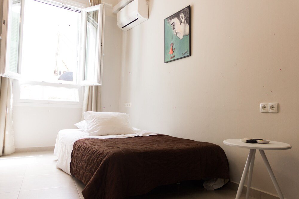 Фото The Central Boutique Αpartments