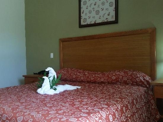 Фото New Garden Hotel