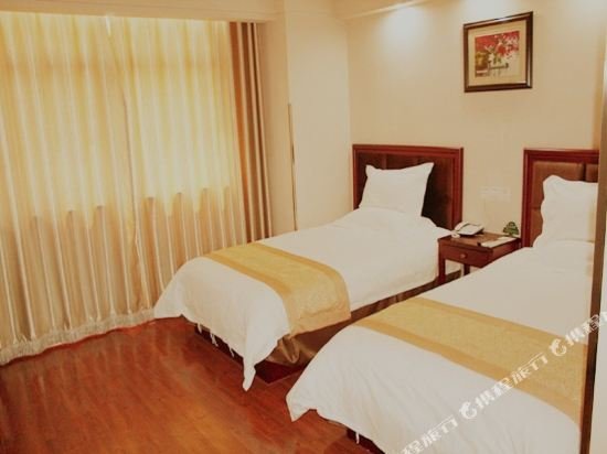 Фото GreenTree Inn Taizhou Taixing East Guoqing Road Rt Mart Business Hotel