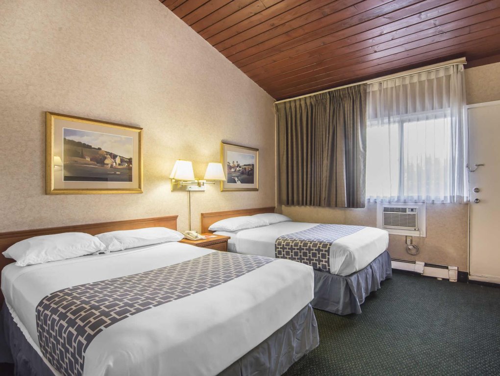 Фото Econo Lodge Motel Village