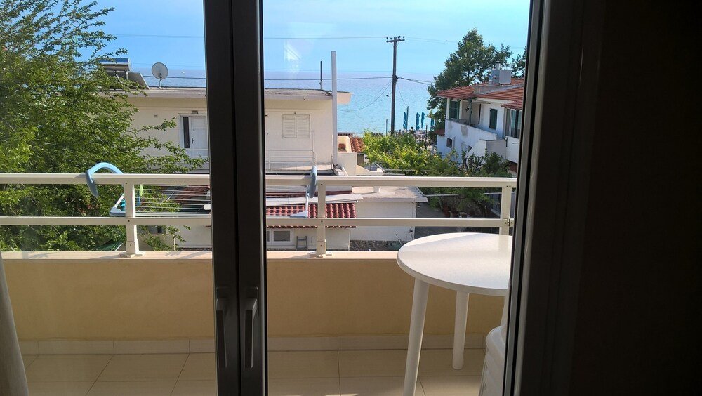 Фото Kyparissis Rooms