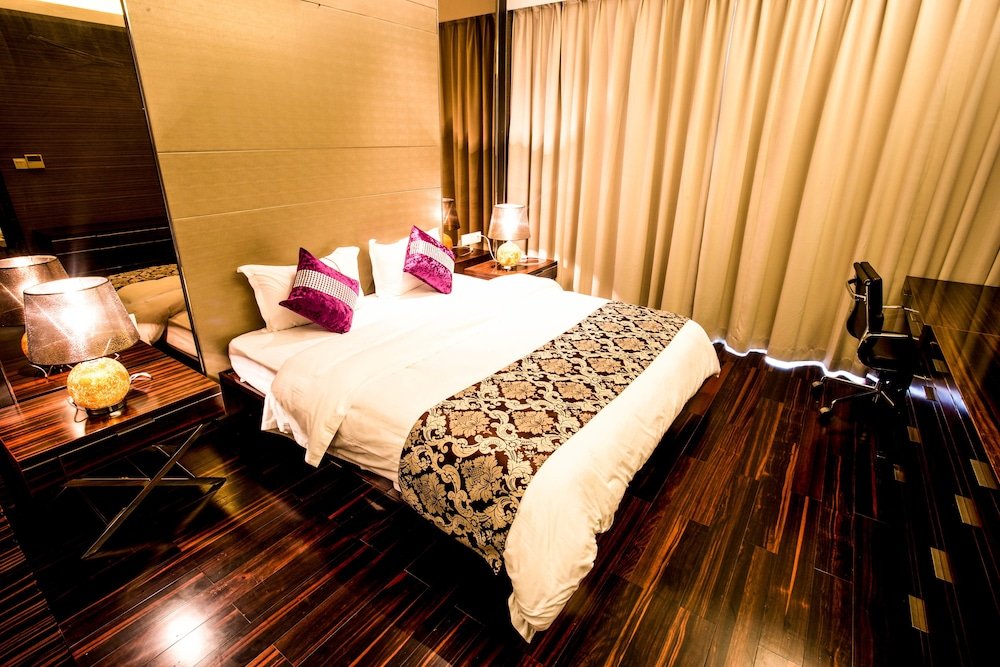 Фото Xingyi International Hotel Poly Store