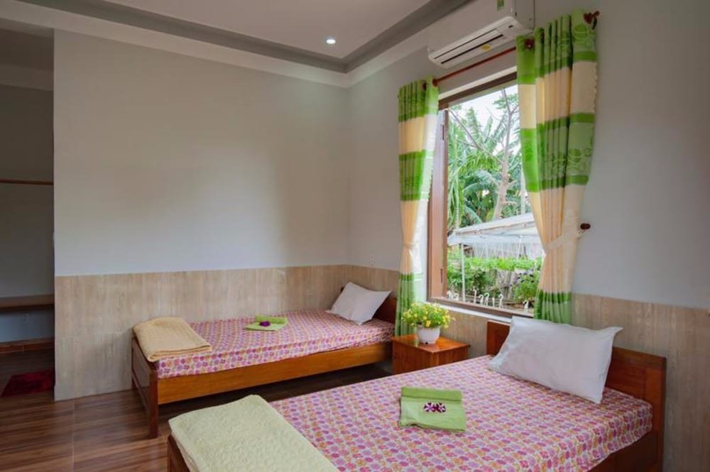 Фото Гостевой Дом Petunia Garden Homestay