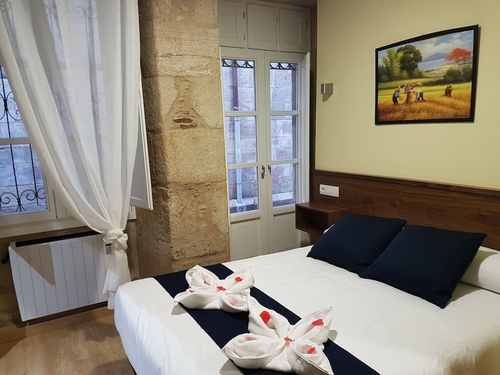 Фото Oxford Suites Santiago de Compostela
