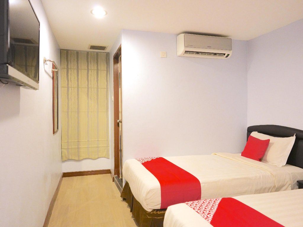 Фото Oyo 89544 Utama Inn