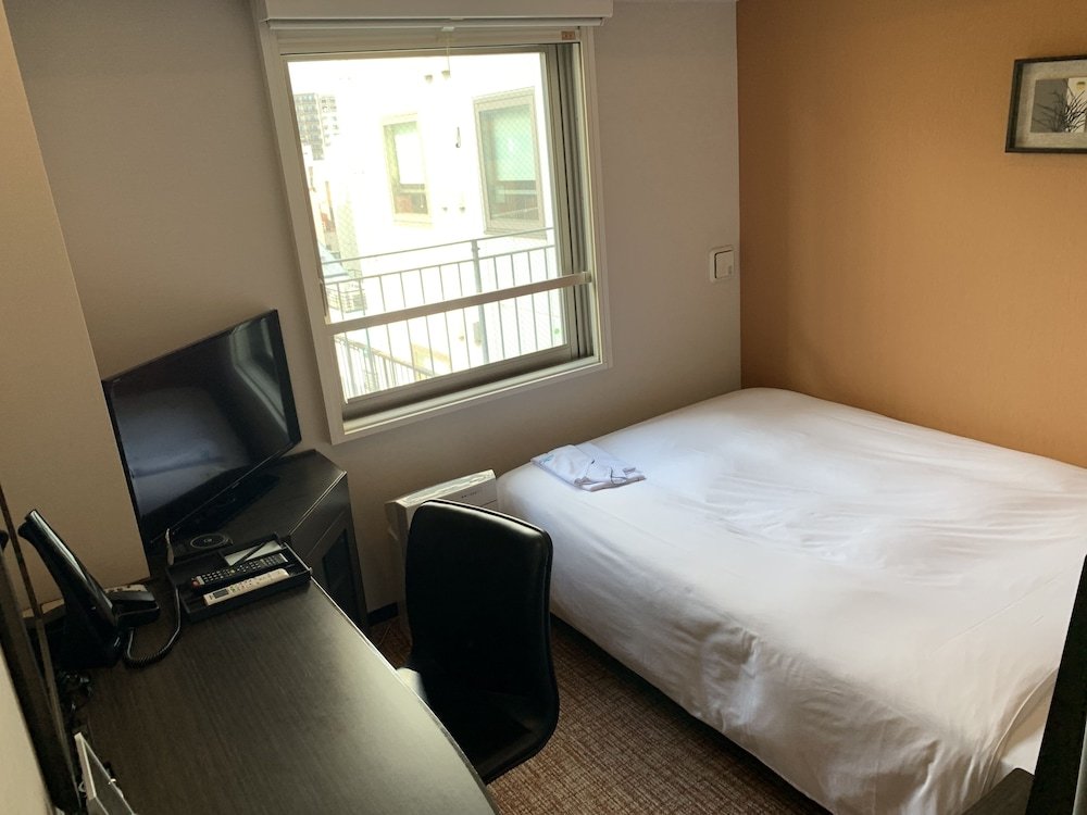 Фото Issyuku Hotel Asakusabashi