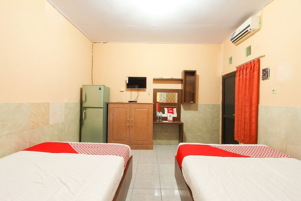 Фото Oyo 1594 Al Firdausi Residence