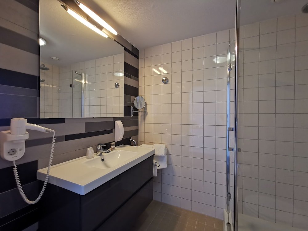 Фото Strandhotel Het Hoge Duin