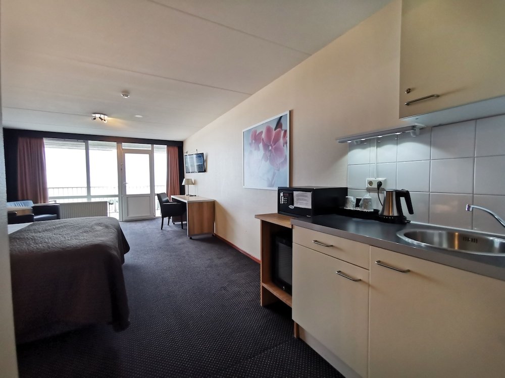 Фото Strandhotel Het Hoge Duin