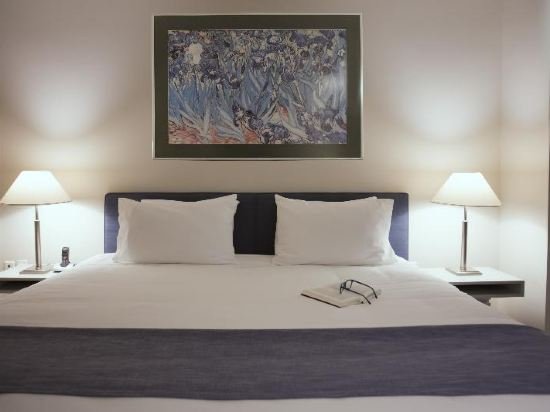 Фото Blazer Suites Hotel