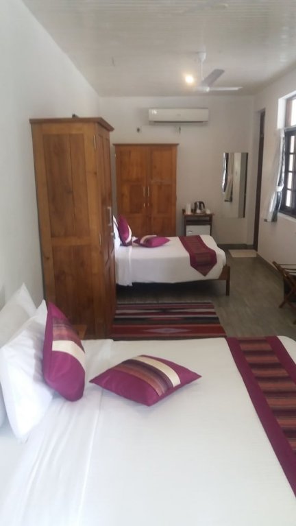 Фото Oyo 103 Lavinia Villa