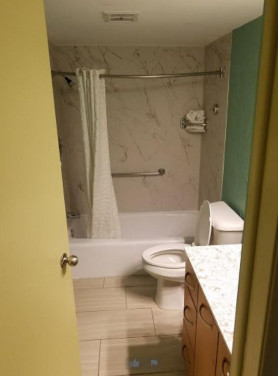 Фото Alden Suites - A Beachfront Resort