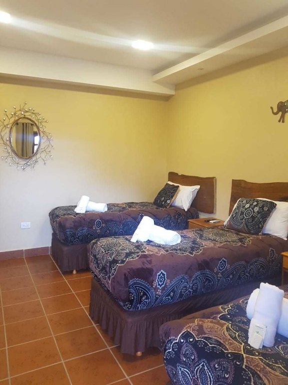 Фото Ambay Suites & Dorms