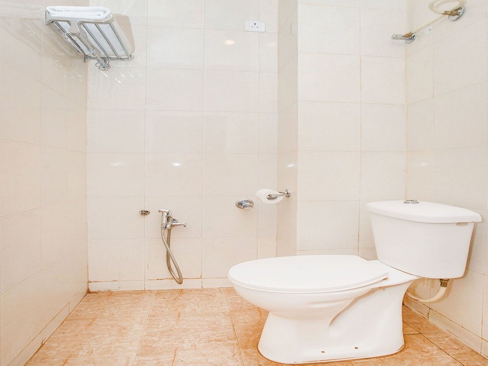 Фото Oyo 7669 The Trinitywood Hotel