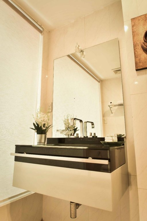 Фото Boss Suites Nana Hotel