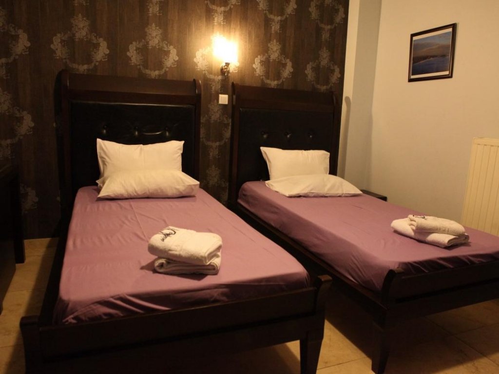 Фото Toti Boutique Rooms