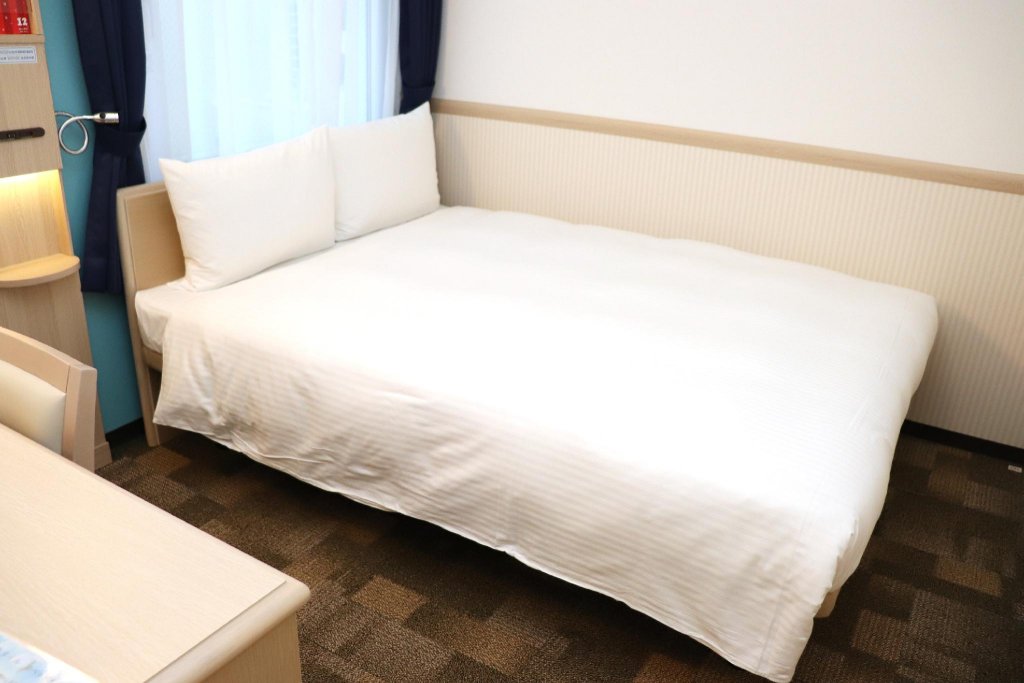 Фото Toyoko Inn Osaka Kadomashi Ekimae