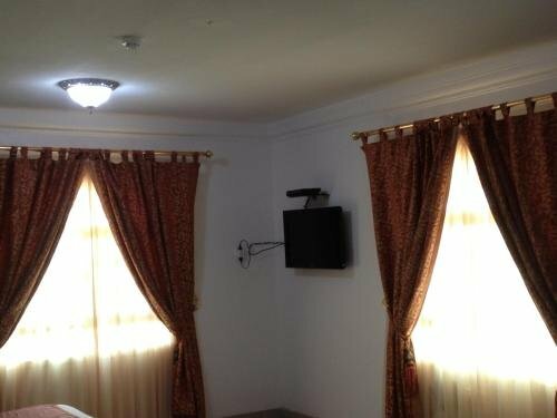 Гостиница Oyo 125 Manam Sohar Hotel Apartments в Сухаре