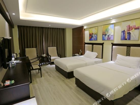 Фото Caifu Holiday Hotel