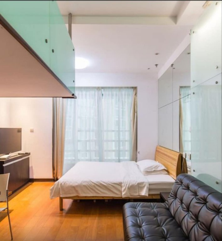 Фото Shanghai Yueyi Apartment Hotel