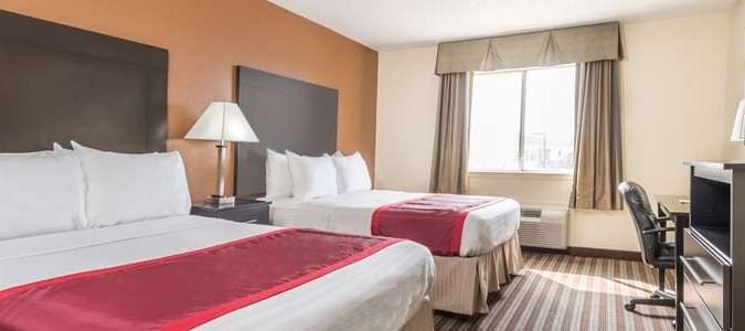 Фото Days Inn & Suites by Wyndham Dallas