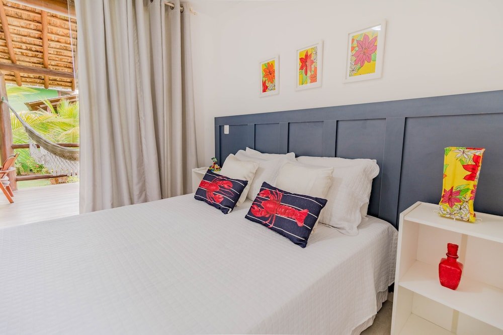 Фото It03 Bangalo Duplex 3 Suites Pe na Areia