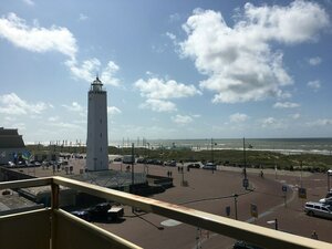 Holiday Apartment With a View of the Dunes, Sea, and Lighthouse