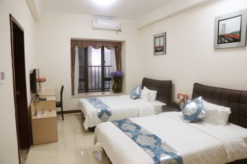 Фото Guangzhou Yi Long International Apartment