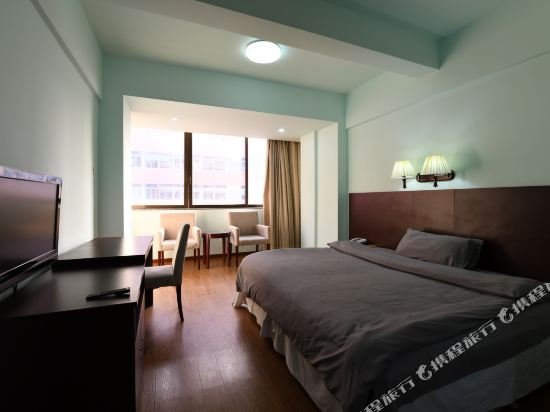 Фото Xinghua Hotel