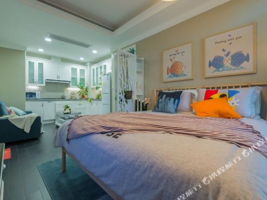 Фото Shanghai Xinchuan Boutique Apartment