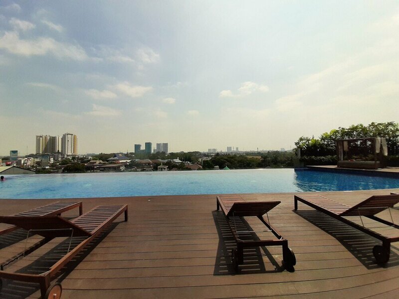 Гостиница Cozy Studio Room Apartment at Springwood Residence в Тангеранге