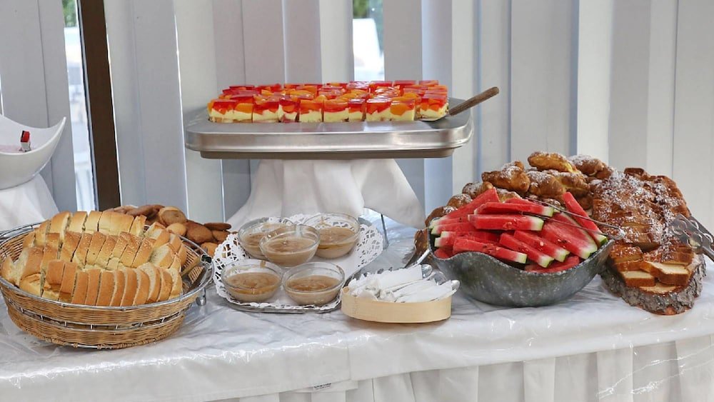 Фото Dionysos Hotel & Suites