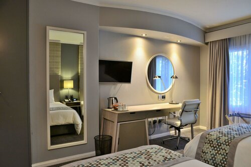 Внешний вид отеля Holiday Inn Johannesburg Airport в Йоханнесбурге, фото 5