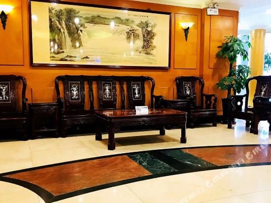 Фото Xinghua Hotel