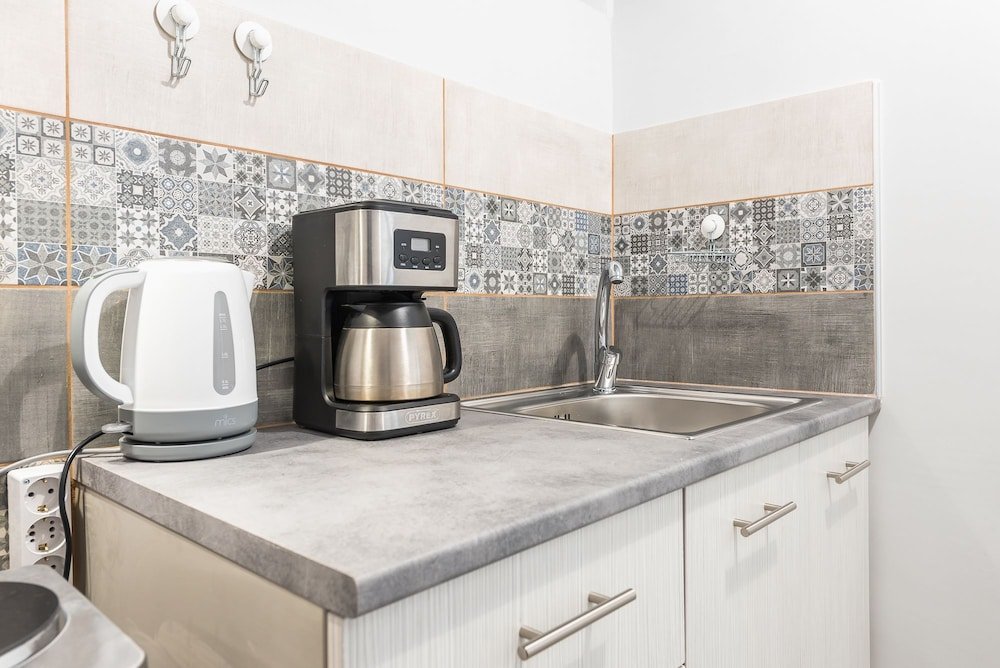 Фото Welcoming Koukaki Home by Cloudkeys