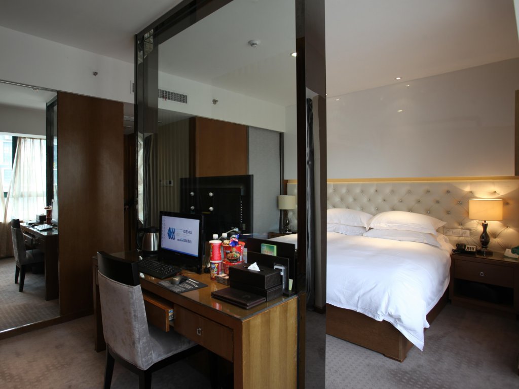 Фото Yiwu Wendemu International Hotel