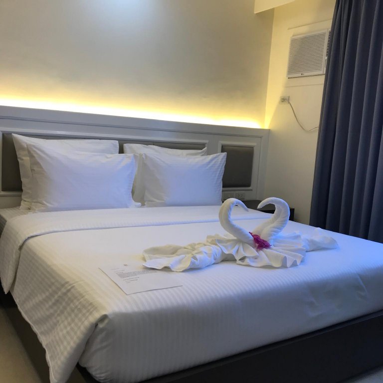 Фото Sotogrande Iloilo Hotel