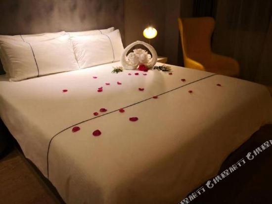 Фото Magnotel Jining Jiaxiang, Zengzi Avenue Hotel