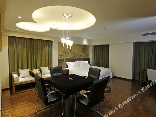 Фото Caifu Holiday Hotel