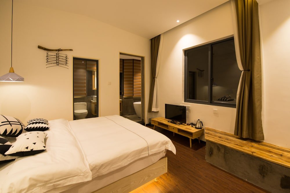 Фото Xiamen Feisu Tianchunshe Holiday Villa